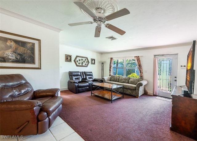 living room with crown molding, visible vents, carpet floors, and ceiling fan