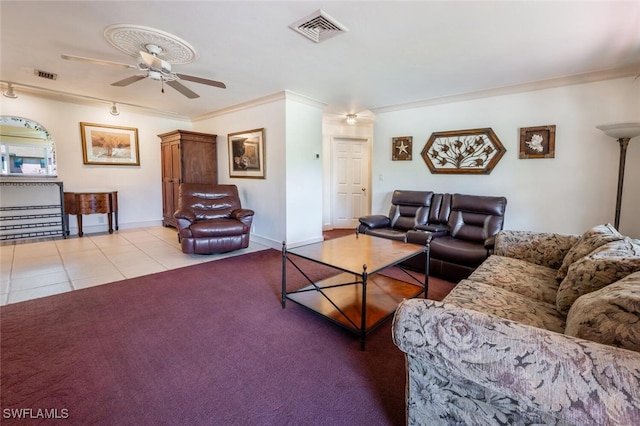 living area with crown molding, light tile patterned flooring, visible vents, and ceiling fan