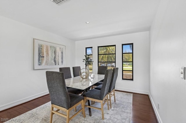 dining space featuring recessed lighting, visible vents, baseboards, and wood finished floors