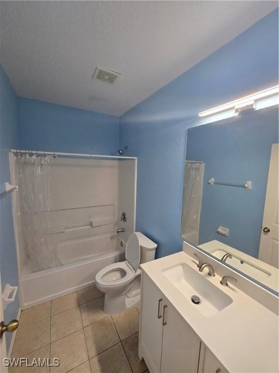 bathroom featuring visible vents, toilet, shower / tub combo, vanity, and tile patterned flooring