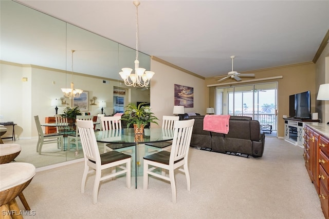 dining area with ornamental molding, light carpet, baseboards, and ceiling fan with notable chandelier