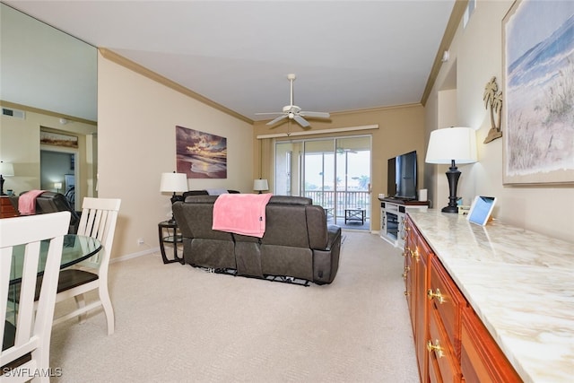 living room with light carpet, ceiling fan, visible vents, and crown molding