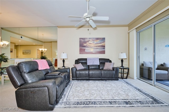 living room featuring ornamental molding, carpet flooring, and ceiling fan with notable chandelier