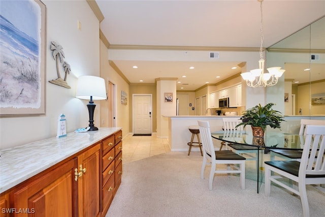 dining area featuring crown molding, recessed lighting, visible vents, an inviting chandelier, and light carpet