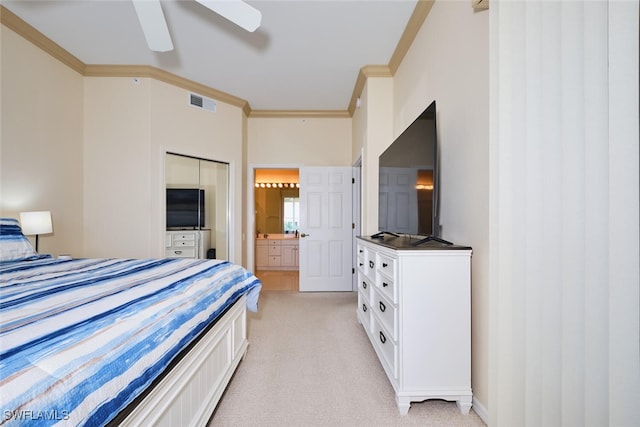 bedroom with light carpet, connected bathroom, visible vents, and crown molding