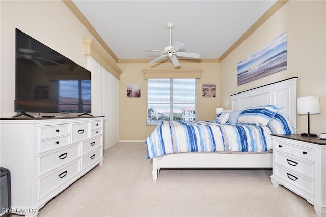 bedroom with light carpet, baseboards, a ceiling fan, and crown molding