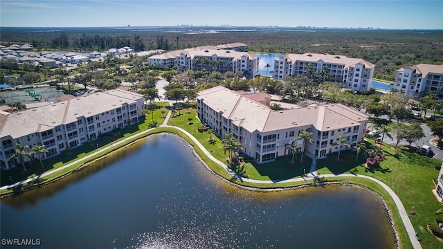 drone / aerial view with a water view