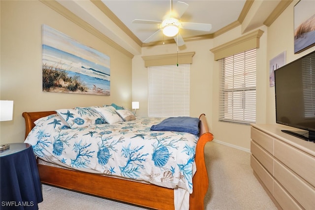 carpeted bedroom with baseboards, ornamental molding, and ceiling fan