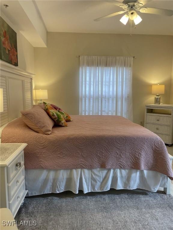 bedroom featuring a ceiling fan and carpet floors