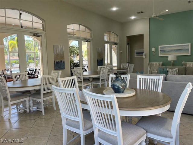 dining room with light tile patterned floors, visible vents, recessed lighting, and french doors