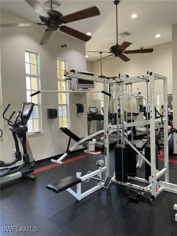 gym featuring recessed lighting, visible vents, and ceiling fan