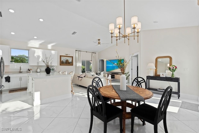 dining space featuring a notable chandelier, recessed lighting, visible vents, and a wealth of natural light