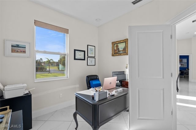 office featuring visible vents and baseboards