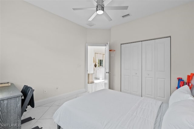 bedroom with visible vents, baseboards, ceiling fan, a closet, and marble finish floor