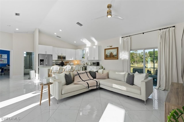 living room featuring visible vents, high vaulted ceiling, marble finish floor, and ceiling fan