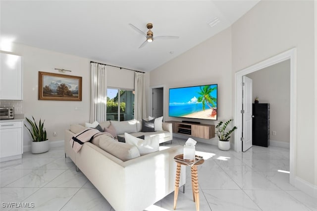 living area featuring baseboards, marble finish floor, high vaulted ceiling, and ceiling fan