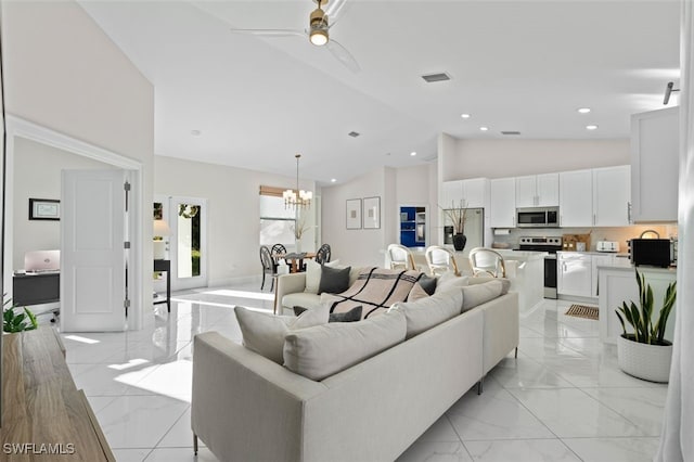 living room featuring visible vents, high vaulted ceiling, marble finish floor, and ceiling fan with notable chandelier