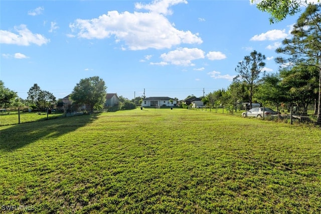 view of yard with fence