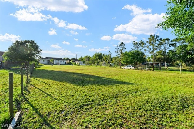 view of yard featuring fence