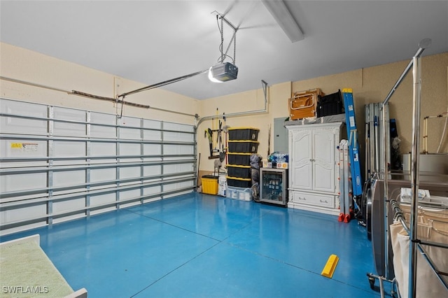 garage featuring a garage door opener