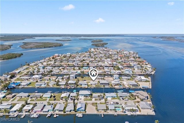 bird's eye view with a residential view and a water view