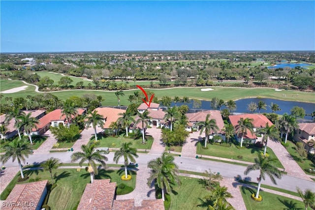 birds eye view of property featuring a water view and golf course view