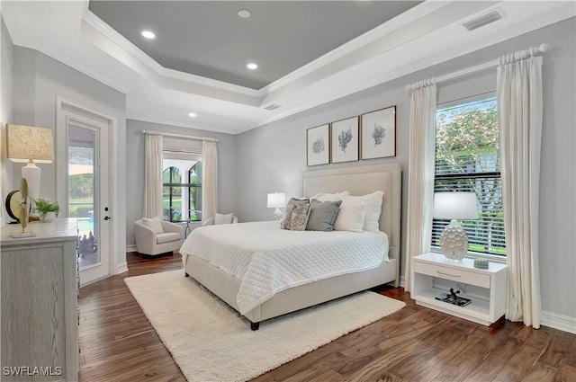 bedroom featuring a raised ceiling, dark wood-style floors, access to outside, crown molding, and recessed lighting