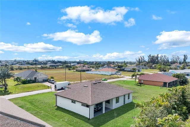 drone / aerial view with a residential view