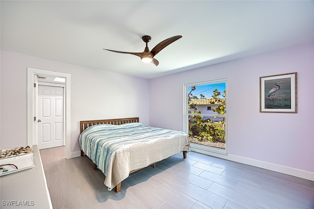 312 Periwinkle Way Unit 9, Sanibel, FL 33957 - bedroom with baseboards and a ceiling fan
