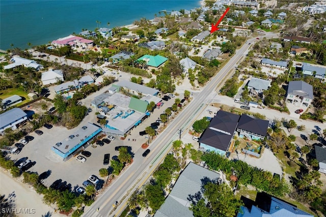 aerial view featuring a water view and a residential view