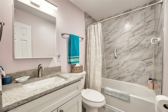 full bath featuring toilet, vanity, and shower / bath combo