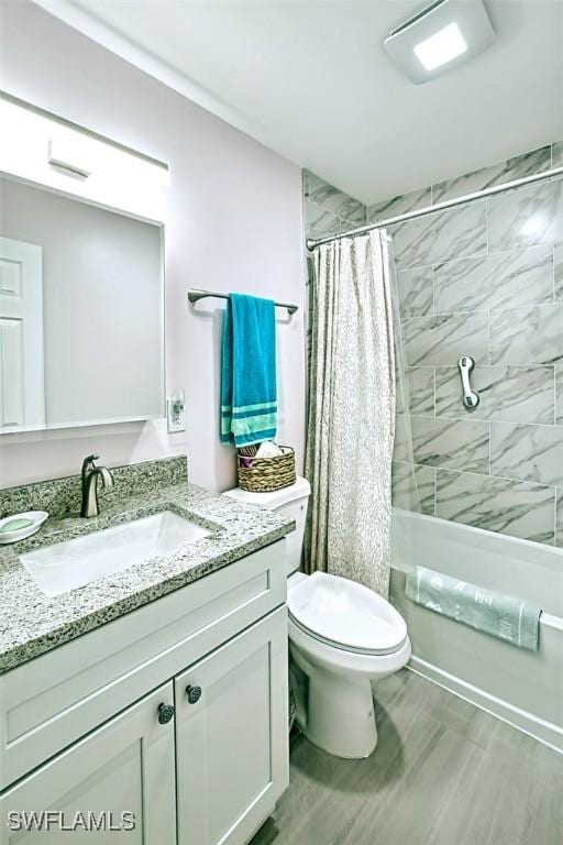 312 Periwinkle Way Unit 9, Sanibel, FL 33957 - full bath with vanity, shower / bathtub combination with curtain, and toilet