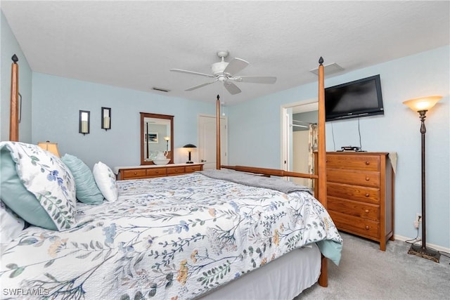 bedroom with carpet, visible vents, ceiling fan, and baseboards