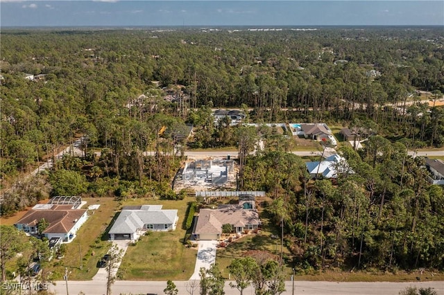 bird's eye view with a forest view