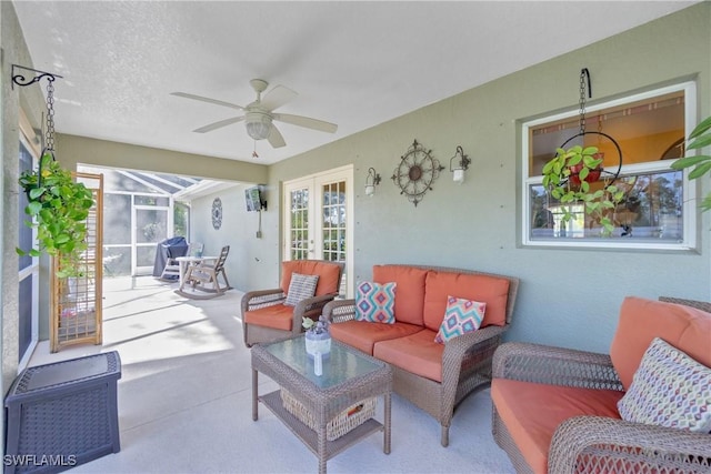 view of patio / terrace featuring an outdoor hangout area, french doors, a lanai, and a ceiling fan