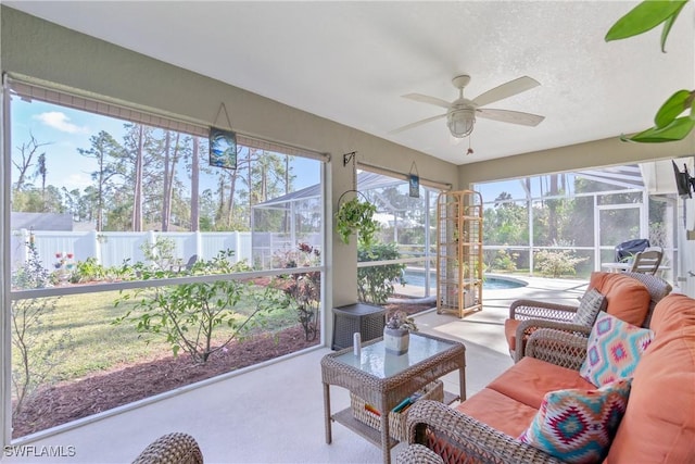 sunroom / solarium with ceiling fan