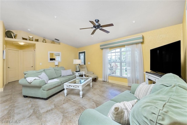 living room with baseboards, vaulted ceiling, and a ceiling fan