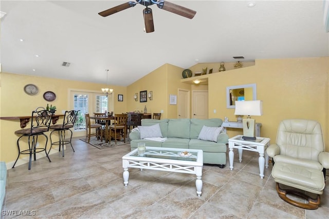 living area with lofted ceiling, visible vents, and ceiling fan with notable chandelier