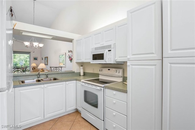 kitchen featuring a sink, white appliances, light tile patterned flooring, and white cabinetry