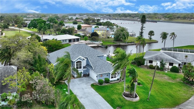 bird's eye view with a water view