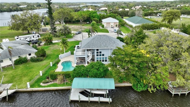 birds eye view of property featuring a water view