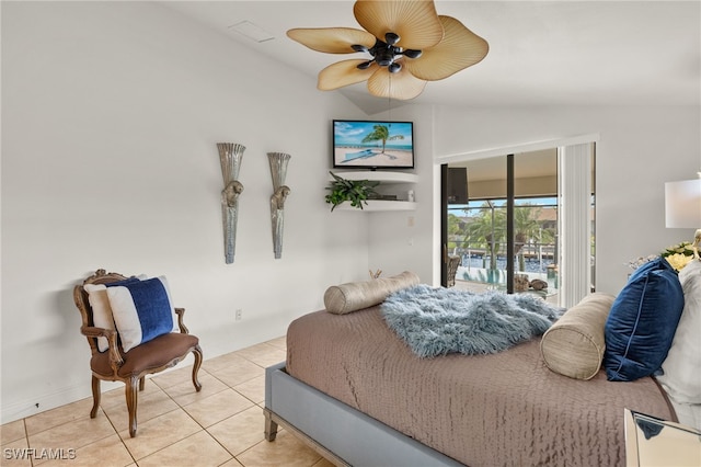 bedroom featuring lofted ceiling, access to outside, ceiling fan, and tile patterned flooring