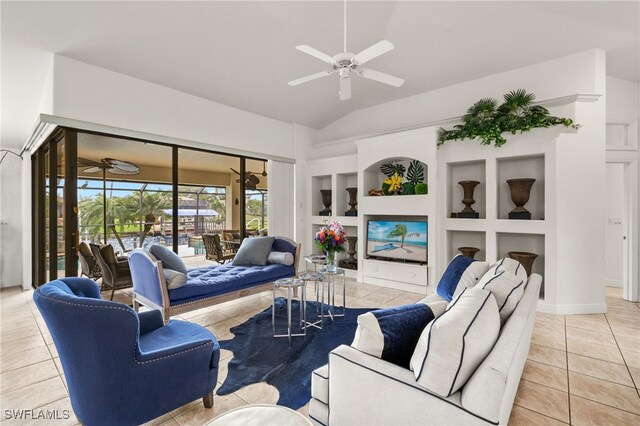 living room with lofted ceiling, tile patterned flooring, built in features, and a ceiling fan