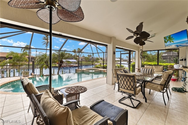 sunroom with a swimming pool and a ceiling fan