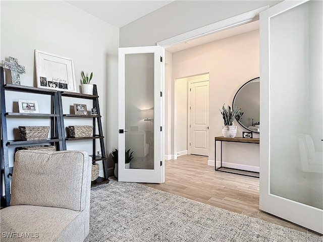 7041 Del Webb Oak Creek Blvd, North Fort Myers, FL 33917 - interior space with french doors, baseboards, and wood finished floors