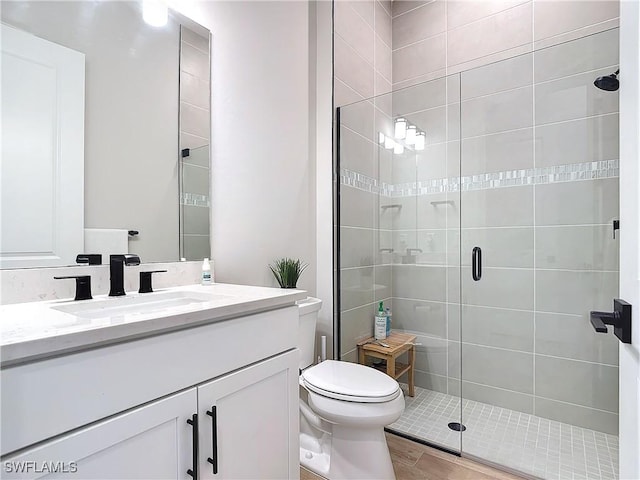 7041 Del Webb Oak Creek Blvd, North Fort Myers, FL 33917 - bathroom with a stall shower, vanity, and toilet