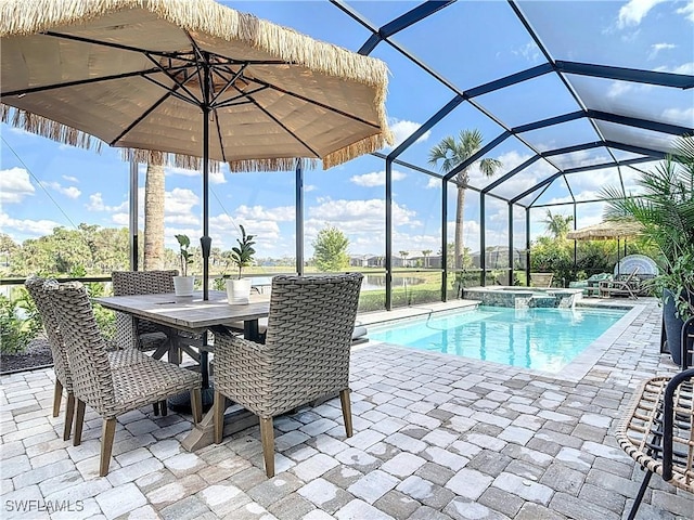 7041 Del Webb Oak Creek Blvd, North Fort Myers, FL 33917 - view of pool with outdoor dining space, a pool with connected hot tub, a patio, and a lanai