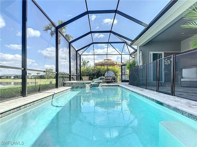 7041 Del Webb Oak Creek Blvd, North Fort Myers, FL 33917 - view of pool featuring a pool with connected hot tub, glass enclosure, and a patio