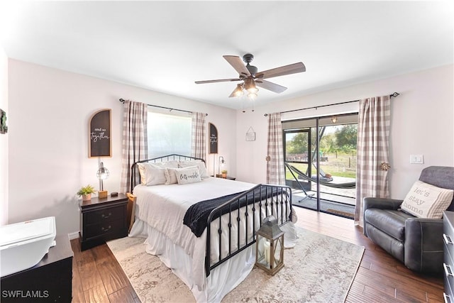 bedroom with access to exterior, ceiling fan, and wood finished floors