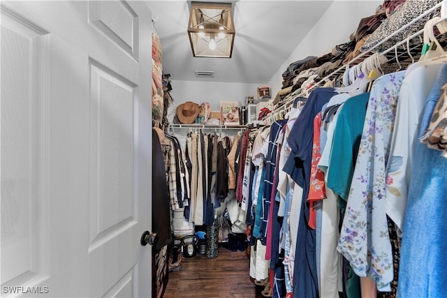 spacious closet with visible vents and wood finished floors